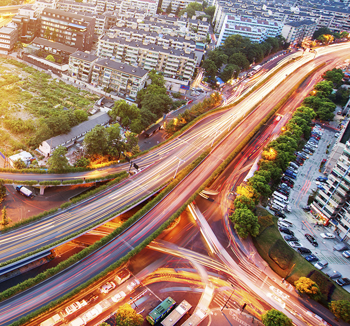 Ariel view of highway with blurred speeding lights.