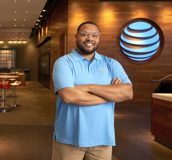 AT&T expert smiling in an AT&T office