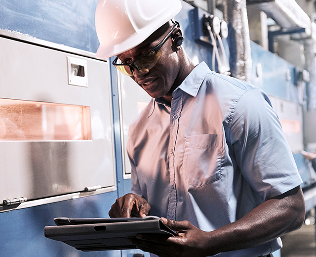 Manufacture inspector professional studying tablet