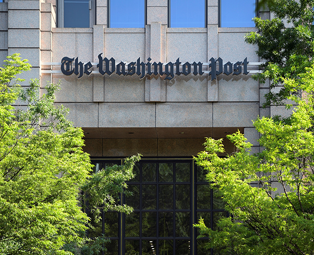 Journalists and audio video engineers working to publish the latest news at The Washington Post operations center.