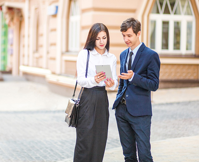 IT woman working and collaborating on iPad represents mobile remote access